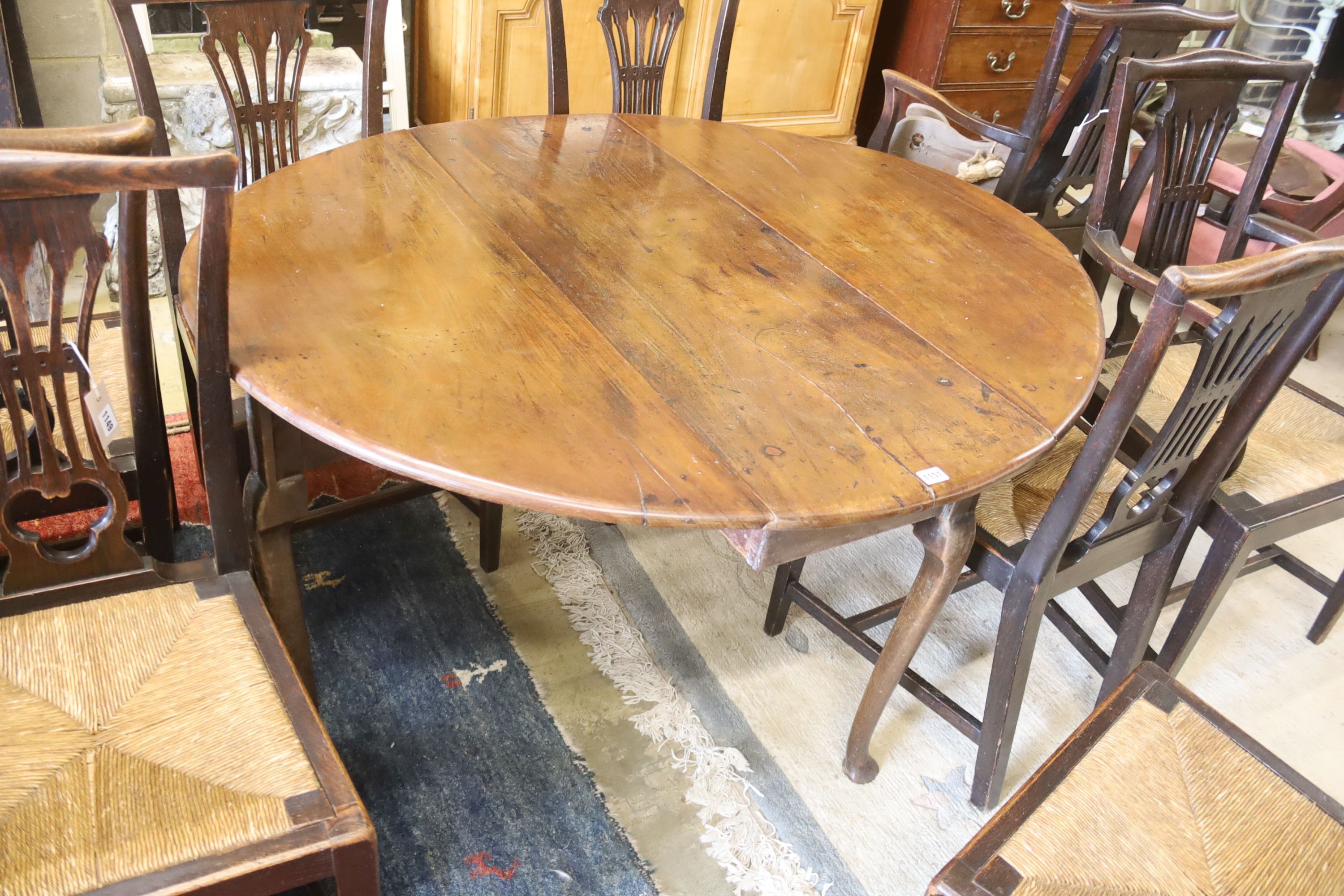 An 18th century mahogany oval drop-flap dining table, length 134cm extended, width 120cm, height 71cm